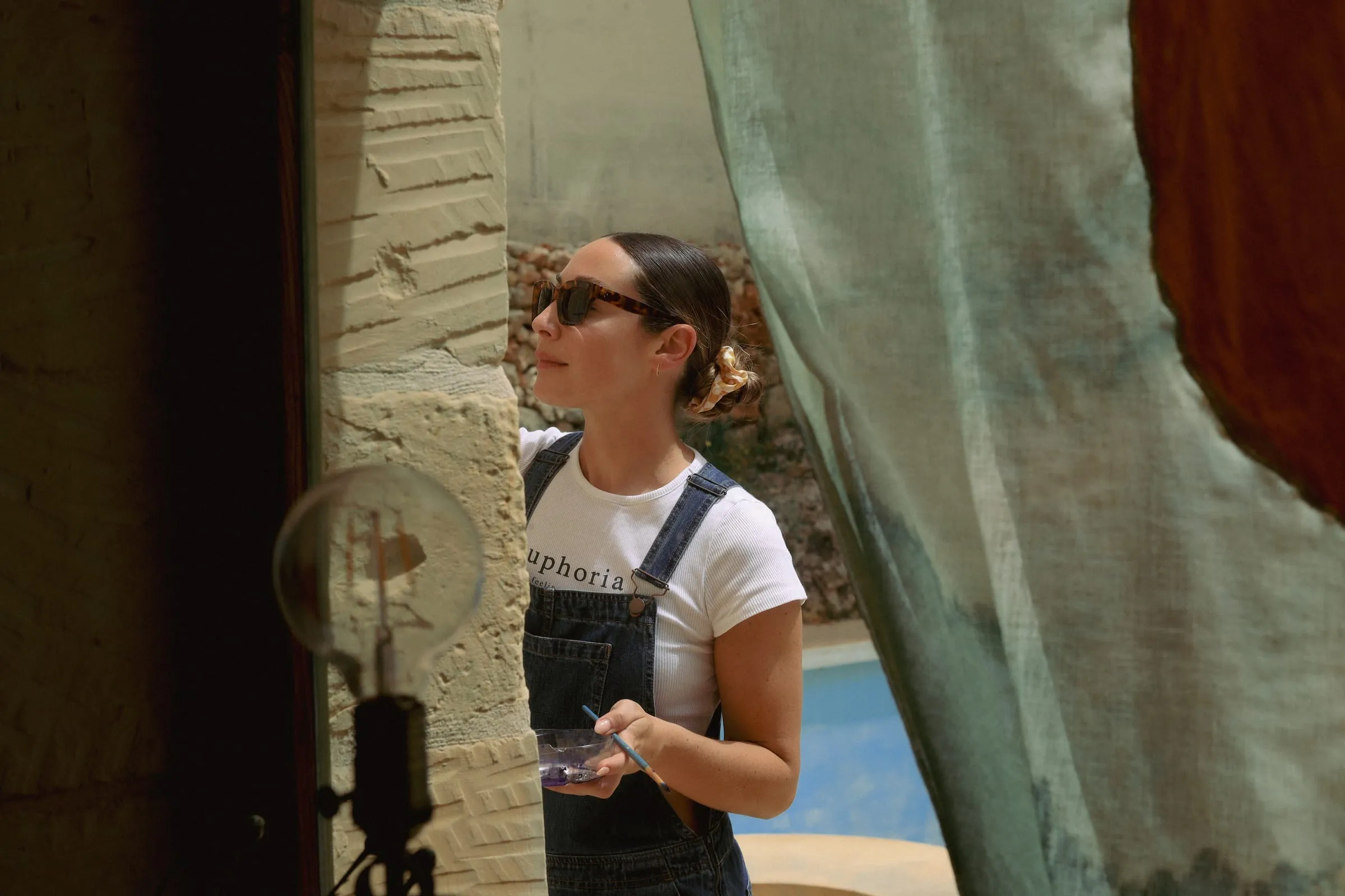 Sarah Muscat Azzopardi on location during a campaign shoot in Malta
